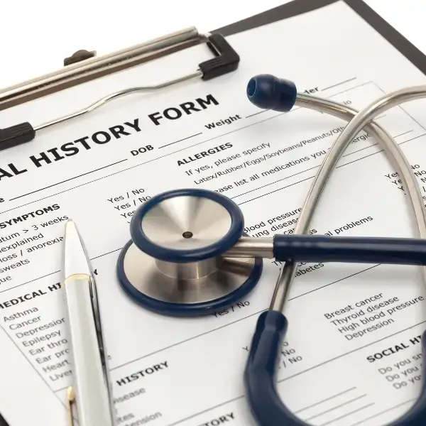 Stethoscope and medical history form on a clipboard at the Nazarenus Hospital Health Information Department in Bulacan