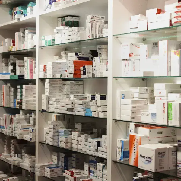 Shelves stocked with medicines and prescriptions at the Nazarenus Hospital Pharmacy in Bulacan