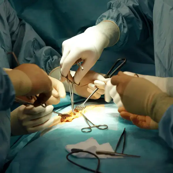 Surgeons performing an operation in a sterile operating room at Nazarenus Hospital Bulacan
